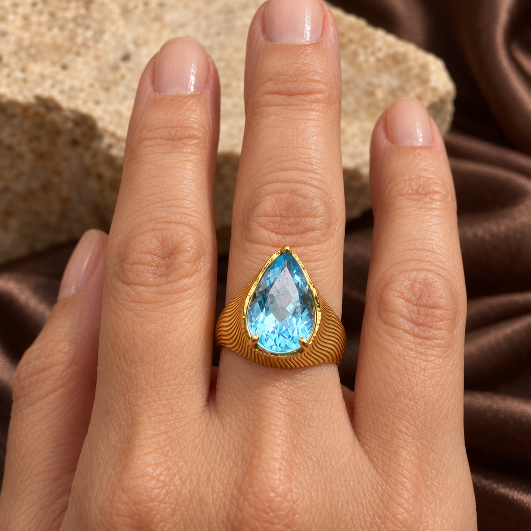 The Gilded Desert Ring | Pear Blue Topaz