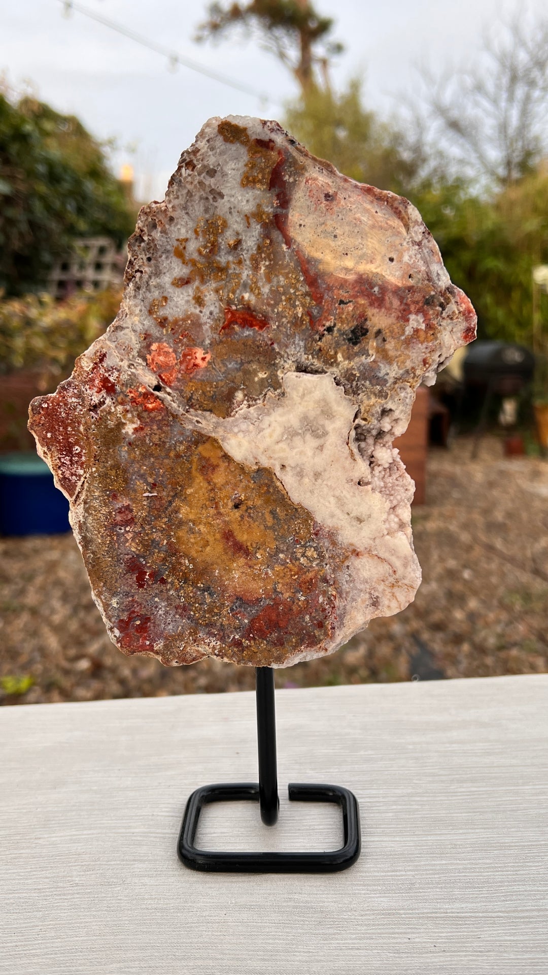 Elegant Pink Amethyst Slab on Black Metal Stand
