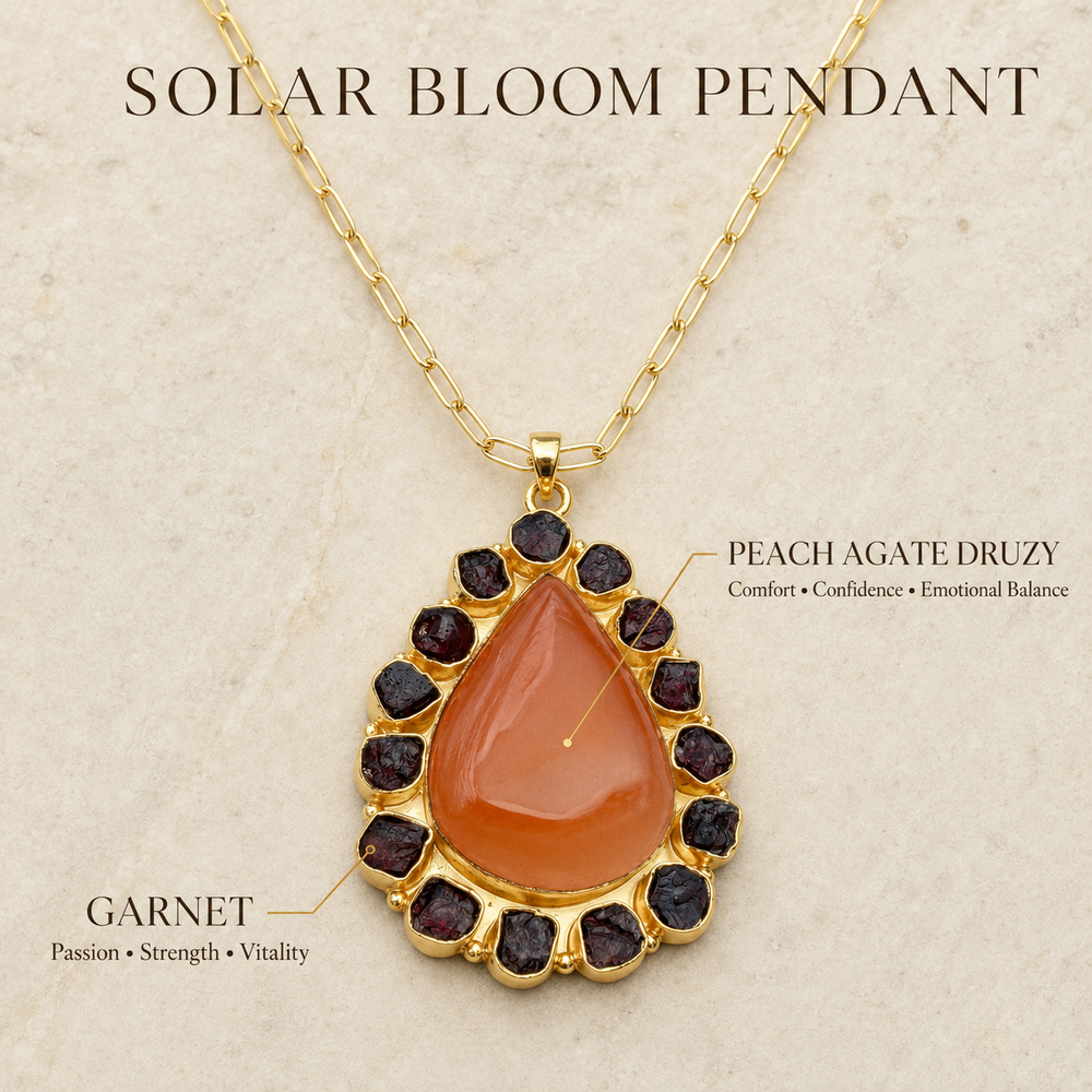 Peach Agate Druzy teardrop pendant surrounded by raw Garnet gemstones