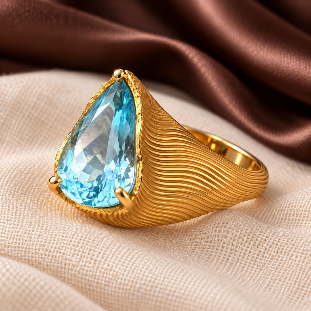 The Gilded Desert Ring | Pear Blue Topaz